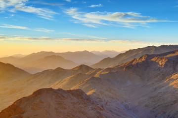 Naklejka na ściany i meble Aerial view of Sinai mountains in Egypt from Mount Moses at sunr