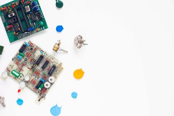 Microprocessor concept. Set of drivers, diodes, capacitors, inductance and other micro electronics on the white background. Top view. Space for a text. Close up.