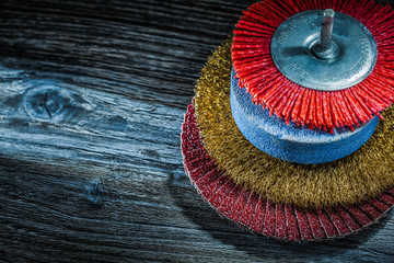 Assortment of abrasive tools on vintage wooden board