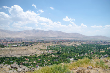 panorama of a town front of the mountains