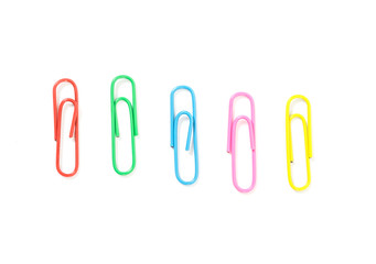Colored paperclips isolated on white background