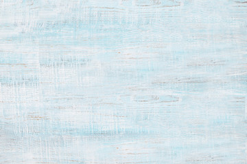 Fototapeta premium old shabby board painted in layers of white and blue, background