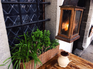 Close-up of a cosy corner of a medieval cafe.