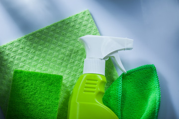 Kitchen dishrag sprayer sponge on white surface