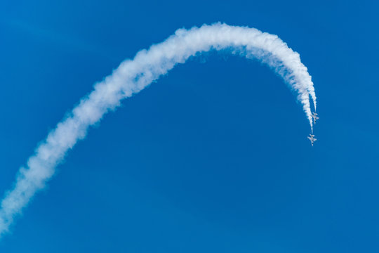 Military fighters fly in formation