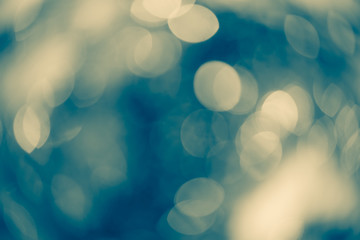 Dreamy teal and yellow bokeh lights for Xmas backdrop