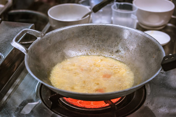 cooking thai food in a cooking class