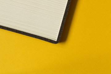 New car air filter isolated on yellow background . Close up. Top view