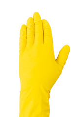 Naklejka na ściany i meble Bright yellow rubber glove with closed fingers on a white background. A hand in a yellow latex glove for cleaning makes a STOP gesture.