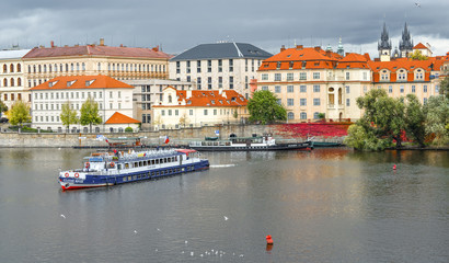 Obraz premium Prague, Czech Republic - October 10, 2017: View on Old Town and Vltava river embankment, Prague, Czech Republic. Prague city center.