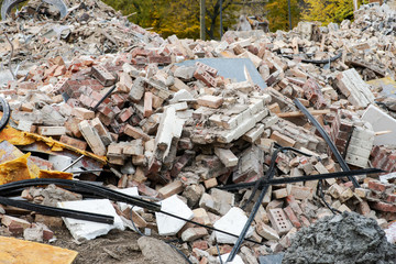 Construction work, demolition of old building to replace with new one.