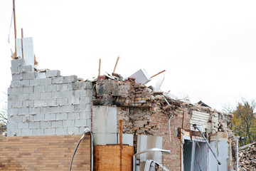 Construction work, demolition of old building to replace with new one.