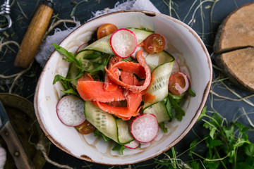 Fresh carrot, cucumber and radish vegetable salad