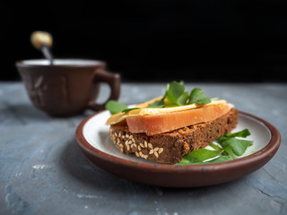 Sandwich with turkey ham and cheese on toasted rye cereal bread