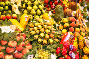 Spain. Barcelona. Sale of exotic fruits in La Boqueria market