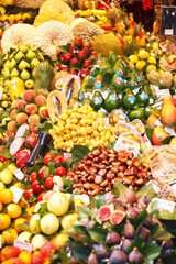 Spain. Barcelona. Sale of exotic fruits in La Boqueria market