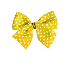 Yellow textile  ribbon bow with  white polka dot  pattern isolated on white background