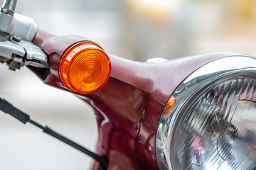 Scooter turn signal light, Orange circle light. part of scooter.