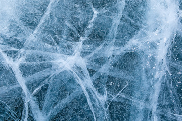 cracked texture of ice on Baikal lake, Winter