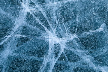 cracked texture of ice on Baikal lake, Winter
