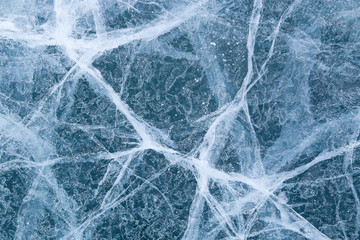 cracked texture of ice on Baikal lake, Winter