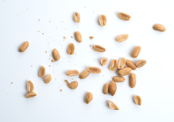 Roasted salted peanuts isolated on a white background