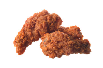 Spicy fried chicken wings on white background