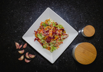 colorful meal with salad, steak and cheese