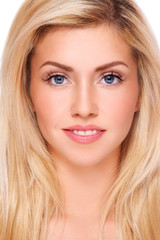 Naklejka premium Portrait of young beautiful fresh healthy smiling blond girl with natural clear make-up