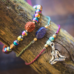 Natural gemstone beads bracelets on wooden background