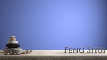 Empty interior design concept zen idea, wooden vintage table or shelf with marble pebble balance and 3d letters making the word feng shui over blue background copy space