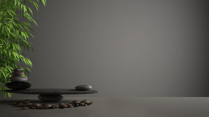 Empty interior design feng shui concept zen idea, white table or shelf with pebble balance and green bamboo, over dark gray background copy space