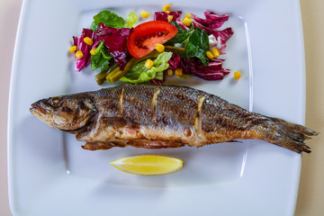 Grilled seabass with lemon