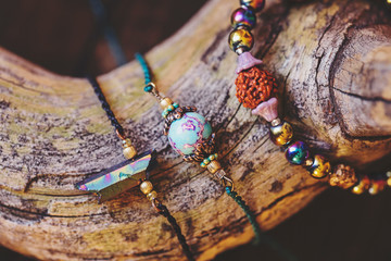 Natural gemstone beads bracelets on wooden background