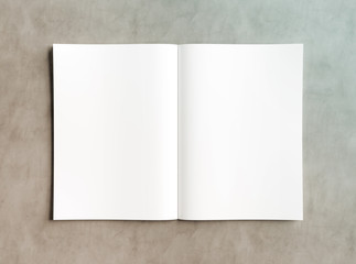 White open magazine mockup on concrete 3D rendering