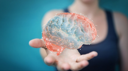 Businesswoman using digital 3D projection of a human brain 3D rendering