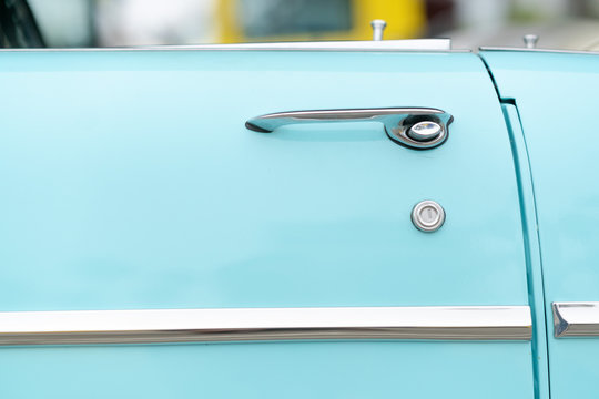 Fototapeta Close up of door of blue vintage car