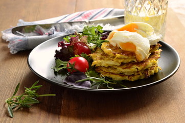 Pancakes with zucchini, eggs and vegetables, healthy breakfast