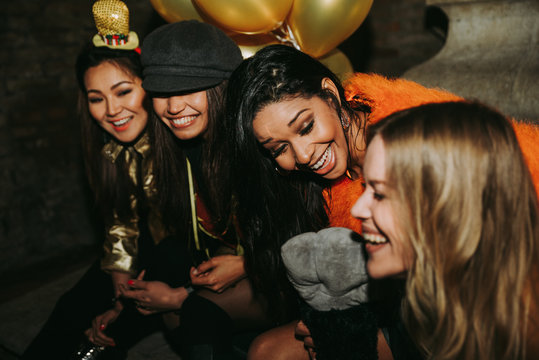 Group of girls celebrating and having fun the club. Concept about women night out