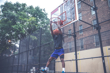 Basketball player training on a court in New york city © oneinchpunch