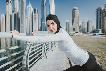 Arabic woman runner, making some urban running