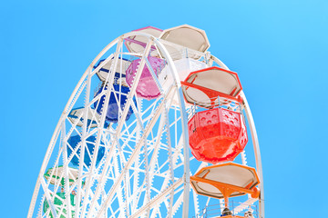 Ferris Wheel against Blue Sky