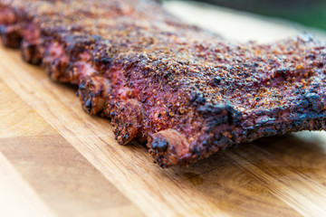 St Louis style grilled pork ribs on cutting board