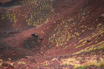 Mount Etna landscape with old volcano craters in cloudy rainy day in September in Sicily, Italy