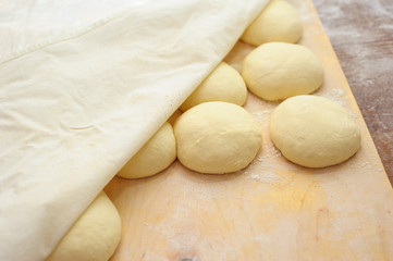 Young children make dough products. Hands closeup

