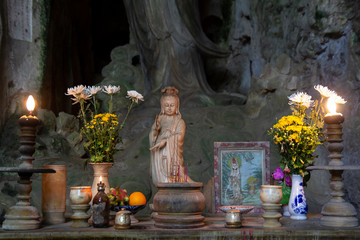 statue on oriental altar in Vietnam
