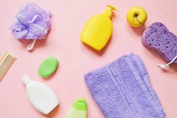 Obraz na płótnie Canvas Flat lay photo toiletries and bath products. Shampoo, shower gel, soap, towel and sponge