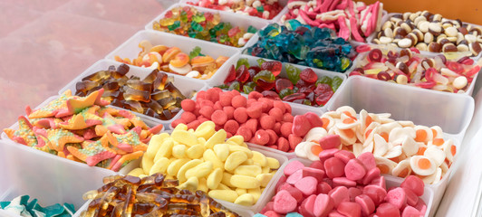 Boxes with different, colorful candies