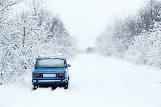blue cars made in the USSR, in the winter forest