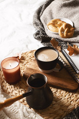 cozy hygge autumn and winter coffee flat lay on bed